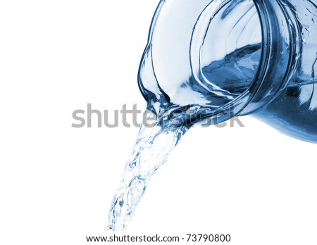 Glass pitcher with water isolated on white