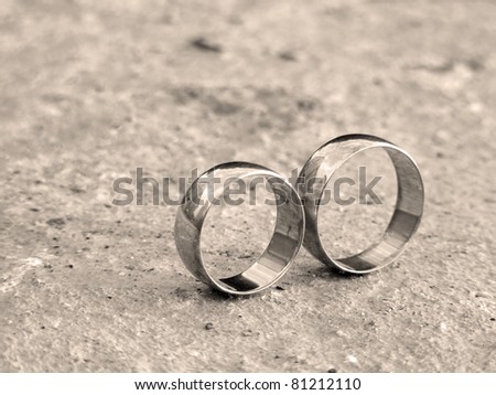 stock photo Wedding rings in infinity sign Sepia style