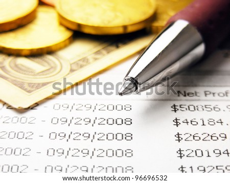 Finance background with pen, money and finance data