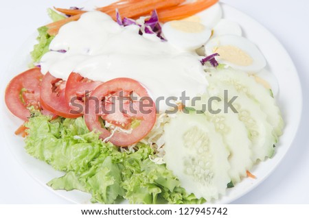 Vegetable salad isolated on white