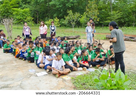 SAI YOK, KANCHANABURI, THAILAND - JULY 1: Unidentified Youth are happy on environmental education activities at Ban Chong Kab Sacred Grove Forest on July 1, 2014 in Sai Yok, Thailand