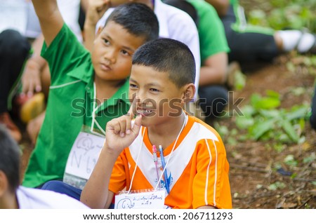 SAI YOK, KANCHANABURI, THAILAND - JULY 1: Unidentified Youth are happy on environmental education activities at Ban Chong Kab Sacred Grove Forest on July 1, 2014 in Sai Yok, Thailand