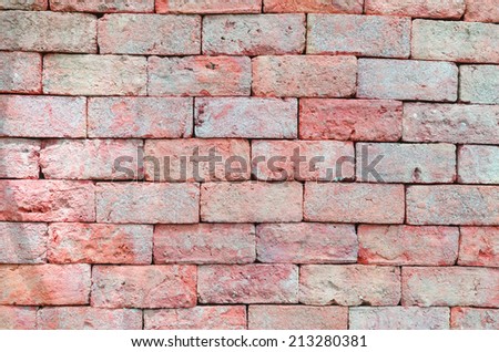 brick wall texture grunge background with vignetted corners of interior