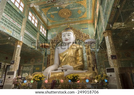BAGAN, MYANMAR, January 21, 2015 : Ananda temple\'s Buddha statue. Bagan Archaeological Zone is a main draw for the country\'s tourism industry and is seen as equal in attraction to Angkor Wat.
