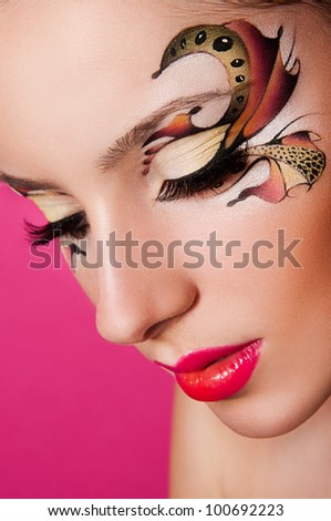 portrait of sexy woman with creative face art