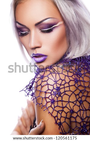 portrait of sexy young woman with cold violet makeup