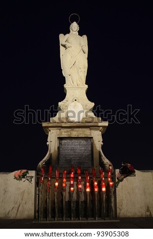 San Rafael Archangel Statue night in Cordoba - Spain.