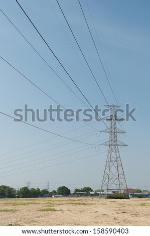 Electric transmission tower 09 : with blue sky and land