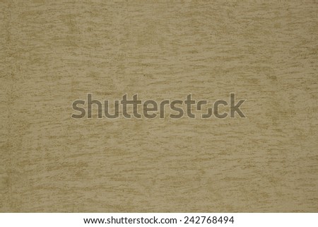 The texture of the plastered walls. Yellow-brown with rough handling