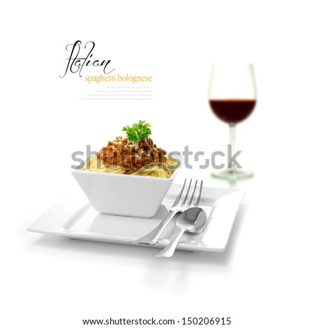 High Key Studio Shot Of Freshly Prepared Italian Spaghetti Bolognese And Red Wine Glass. Selectively Lit To Create Soft Shadows. Copy Space.