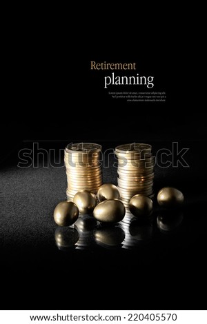 Concept image for retirement planning. Creatively lit golden eggs with stacked coins representing client investments. Copy space.