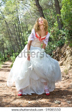 stock photo Portrait of a beautiful blond girl in wedding dress 