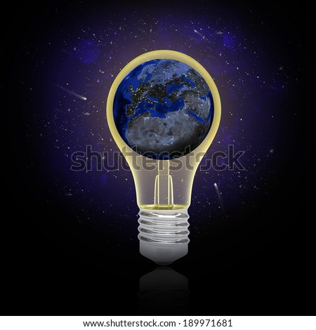 Earth inside the bulb. Concept Earth\'s electricity. Elements of this image are furnished by NASA