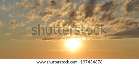 Evening blue sky. Clouds and sunset gold color