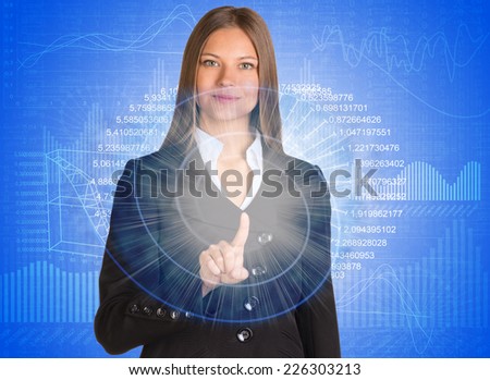 Businesswoman pointing her finger on glowing spiral. Graphs as backdrop