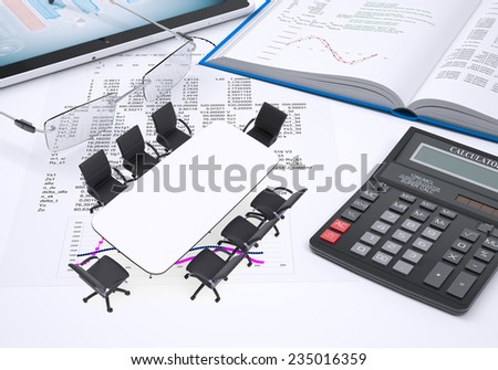 Miniature rectangle table with chairs, tablet pc, book, calculator and glasses, all on paper with columns of figures. Business concept.