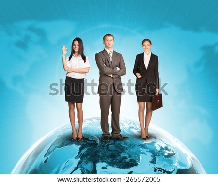 Business people in suit standing on Earth surface. Background is world map with blue gradient. Elements of this image furnished by NASA