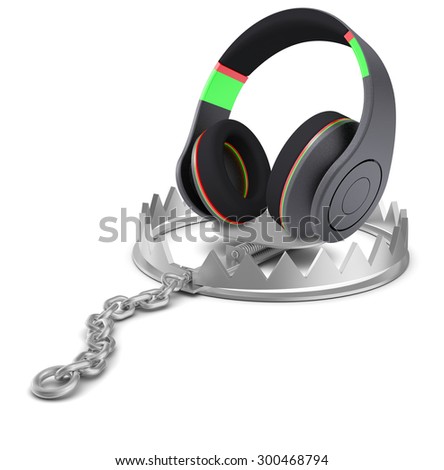 Headphones in bear trap on isolated white background, close-up view