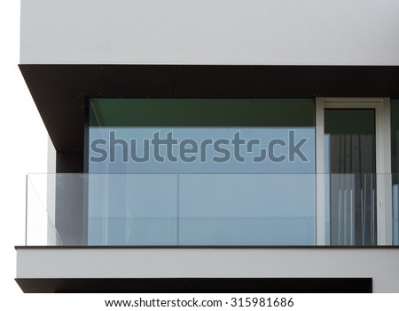 Glass balcony of modern house, close up view