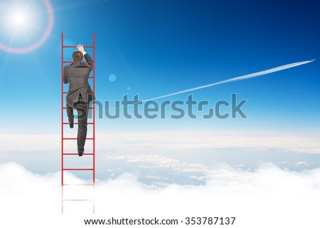 Businessman climbing ladder on blue sky background, rear view