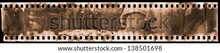 old film strip with part of a man\'s face