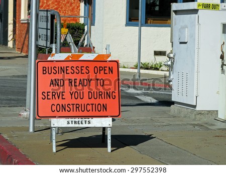 MONTEREY, CA - NOVEMBER 14:  Business Open During Construction Sign  2012