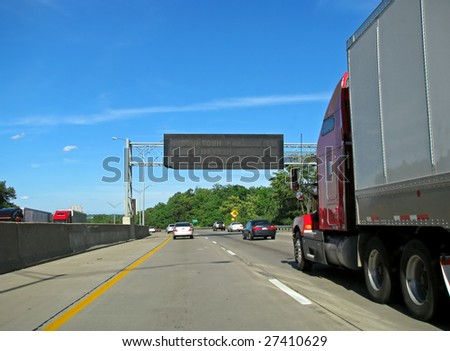 big semi trailer truck driving on highway
