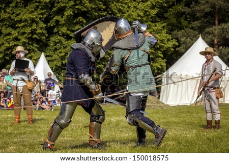 CHORZOW,POLAND, JUNE 9: Fight of medieval knights during a IV Convention of Christian Knighthood on June 9, 2013, in Chorzow