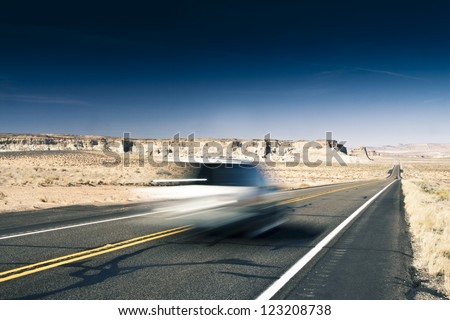 Fast car on a desert highway
