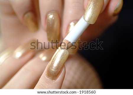 Woman making up her nails