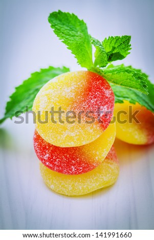 fruit gums and mint leaf