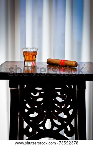 ,whiskey drink and cigar on old wood,
