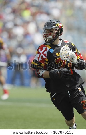 FOXBOROUGH - 28 MAY: Drew Snyder (23), University of Maryland, College Park, carries the ball at the NCAA Men\'s Division 1 Lacrosse Championship game in Foxborough, Massachusetts, 28 May 2012.