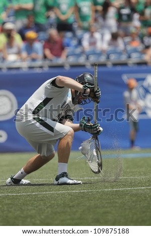 FOXBOROUGH - 28 MAY: Jack Runkel (24) of Loyola University Maryland saves a goal against the University of Maryland, College Park at the NCAA Men's Division 1 Lacrosse Championship game, 28 May 2012.