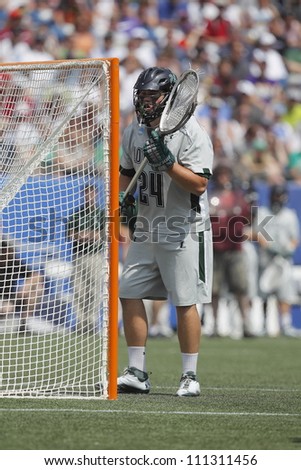 FOXBOROUGH - 28 MAY: Jack Runkel (24), Loyola University Maryland, saves a goal against the University of Maryland, College Park at the NCAA Men's Division 1 Lacrosse Championship game, 28 May 2012 in Foxborough, Massachusetts