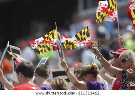 FOXBOROUGH - 28 MAY: University of Maryland, College Park, fans wave the flags at the NCAA Men\'s Division 1 Lacrosse Championship game, 28 May 2012 in Foxborough, Massachusetts