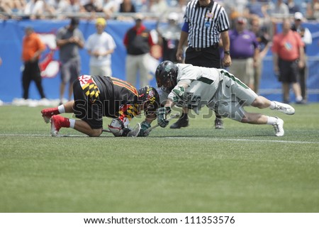 FOXBOROUGH - 28 MAY: J.P. Dalton (45), Loyola University, and a Maryland player at the face-off at the NCAA Men\'s Division 1 Lacrosse Championship game in Foxborough, Massachusetts, 28 May 2012.