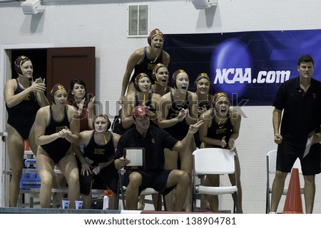 BOSTON - 12 MAY: The University of Southern California squad cheering their team at the NCAA Women\'s Division 1 championship Water Polo game in Boston, Massachusetts, 12 May 2013