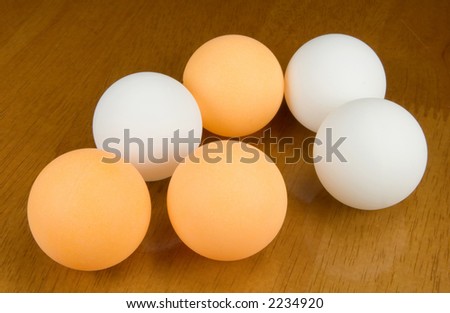 six table tennis balls white and yellow