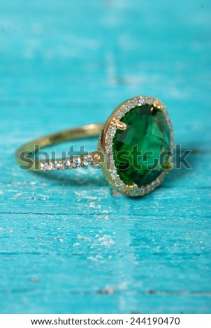 Jewelry ring on old wooden table