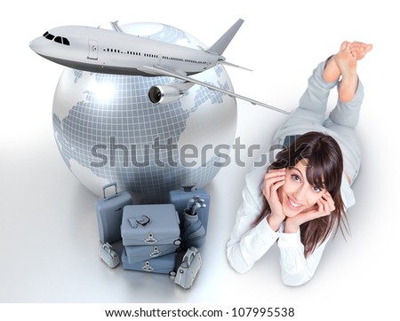 Young woman lying on the floor by a pile of luggage the Earth and a flying plane