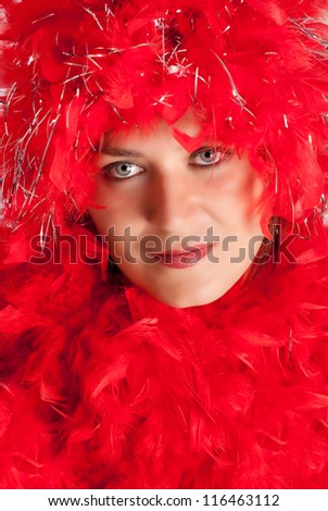 Woman in party gear with feather boa
