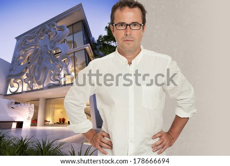 Man standing by an elegant building