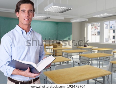 Young teacher in an empty classroom