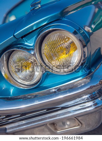 Front detail on a retro blue car