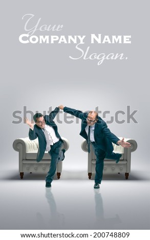 Humorous shot of a pair of running businessmen