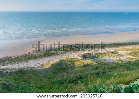 Beautiful Normandy beach, with remains of the Landing