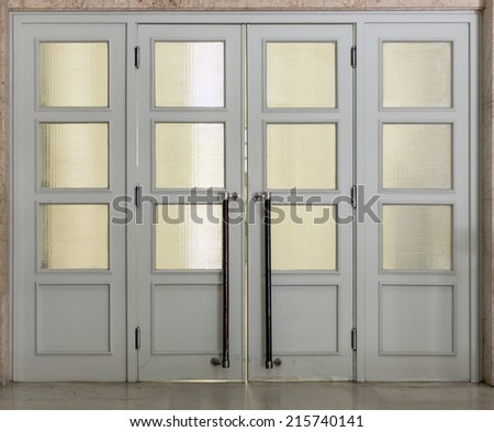 Gray quartered doors with glass panels