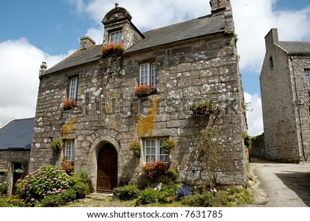 Ancient moss covered stone village house