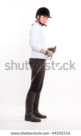 horseback riding outfit. in horse riding clothes